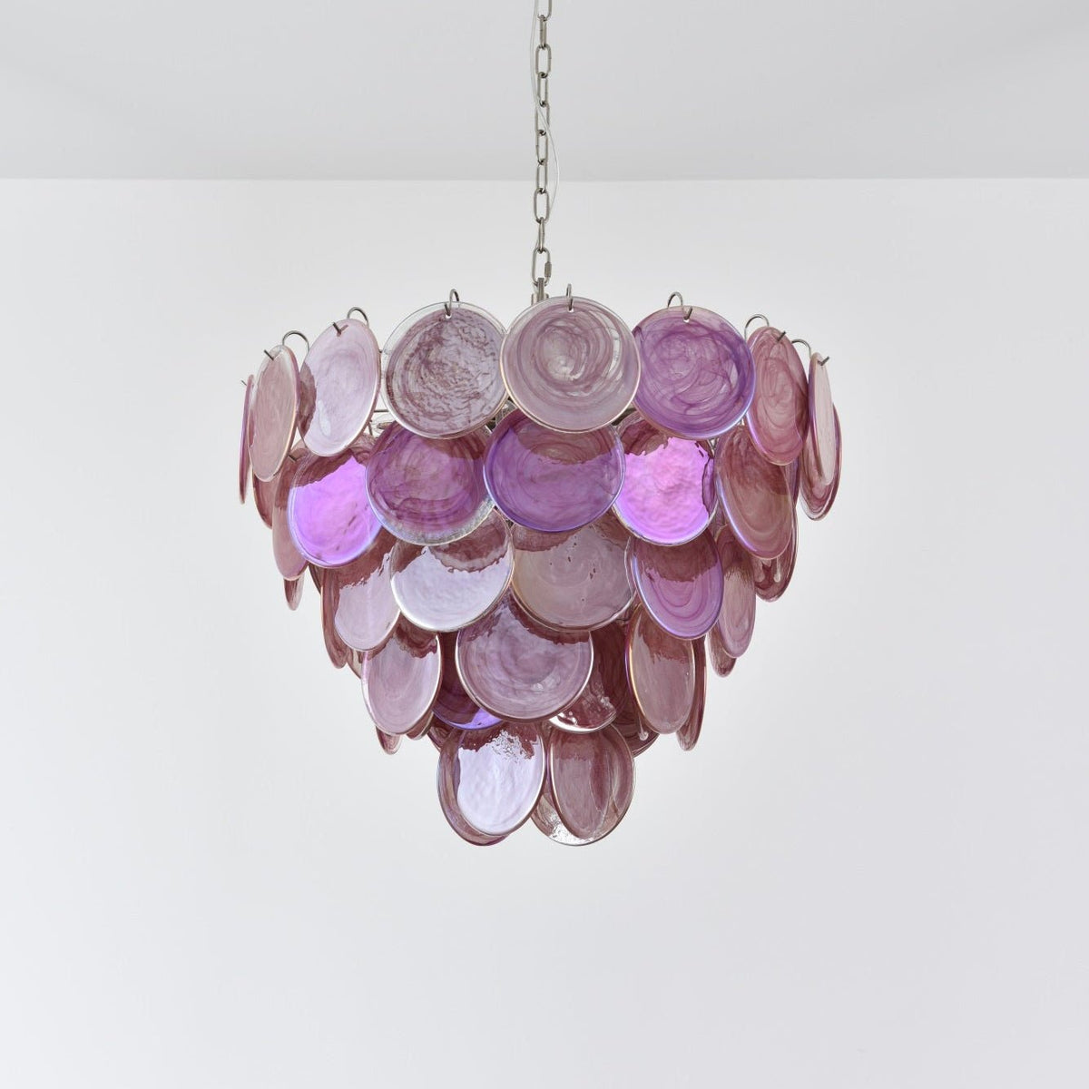 Pink Glass Disc Chandelier with Soft Light — lifestyle view